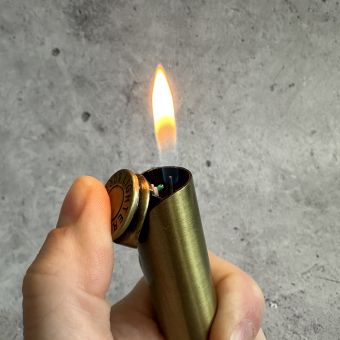 Зажигалка газовая патрон Череп, золото
